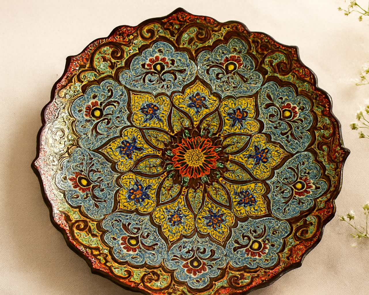 Bright close-up lifestyle image of Garden of Eternal Spring ceramic plate with floral details